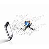 Image of businessman jumping out of mobile phone