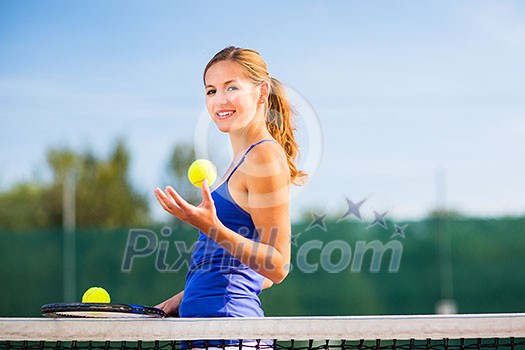 Portrait of a pretty young tennis player with copyspace Portrait of a pretty young tennis player with copyspace