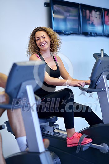 sport, fitness, lifestyle, technology and people concept - smiling woman exercising on treadmill in gym sport, fitness, lifestyle, technology and people concept - smiling woman exercising on treadmill in gym