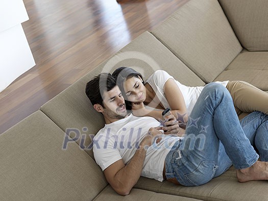 cheerful happy young couple making selfie together at home cheerful happy young couple making selfie together at home