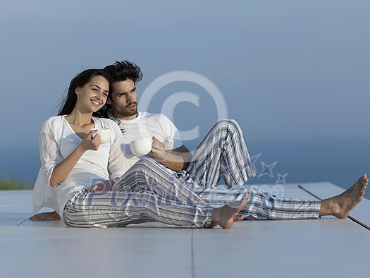 romantic happy young couple relax at modern home indoors romantic happy young couple relax at modern home indoors