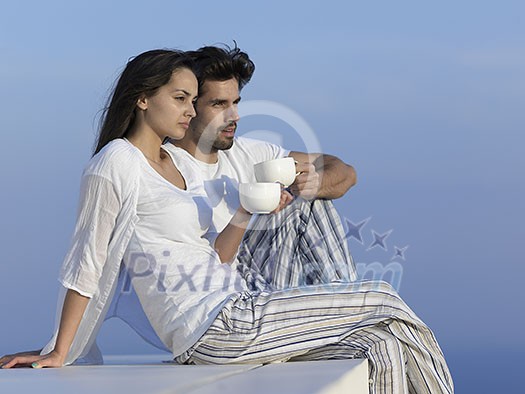 happy young romantic couple have fun relax smile at modern home outdoor terace balcony terace happy young romantic couple have fun relax smile at modern home outdoor terace balcony terace
