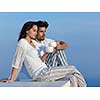 happy young romantic couple have fun relax smile at modern home outdoor terace balcony terace