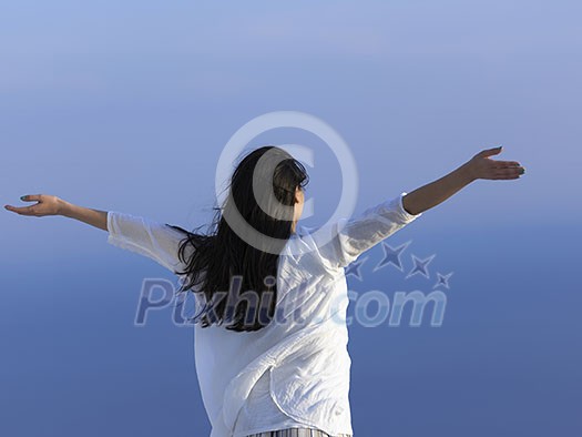 happy young woman enjoy sunset while dancing and enjoy music on headphones happy young woman enjoy sunset while dancing and enjoy music on headphones