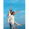 happy young romantic couple have fun relax smile at modern home outdoor terace balcony terace