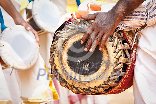 Man playing on drum Man playing on drum