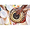 Man playing on drum