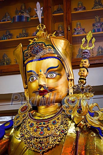 Gilded statue of Guru Padmasambhava in Tsuglagkhang temple. McLeod Ganj, Himachal Pradesh, India Gilded statue of Guru Padmasambhava in Tsuglagkhang temple. McLeod Ganj, Himachal Pradesh, India