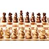 Wooden chess pieces on chessboard. Selective focus, shallow depth of field