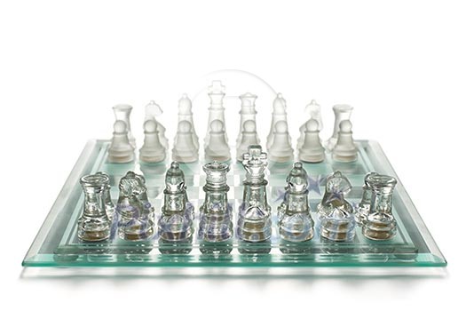 Glass chess on chess board Glass chess on chess board