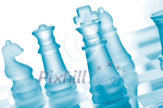 Glass chess on chess board Glass chess on chess board