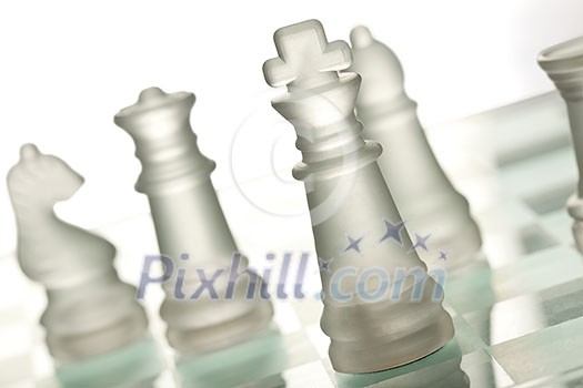 Glass chess on chess board Glass chess on chess board