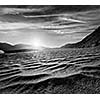 Sand dunes in Himalayas on sunrise. Hunder, Nubra valley, Ladakh, India. Black and white version