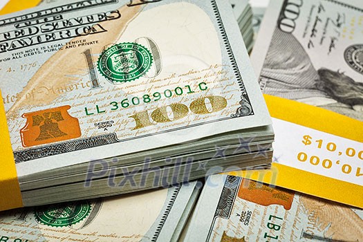 Creative business finance making money concept - background of of new 100 US dollars 2013 edition banknotes bills bundles close up Creative business finance making money concept - background of of new 100 US dollars 2013 edition banknotes bills bundles close up