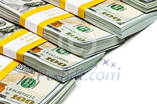 Creative business finance making money concept - stack of bundles of 100 US dollars 2013 edition banknotes bills isolated on white Creative business finance making money concept - stack of bundles of 100 US dollars 2013 edition banknotes bills isolated on white
