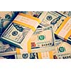 Creative business finance making money concept. Vintage retro effect filtered hipster style image of background of of new 100 US dollars 2013 edition banknotes (bills) bundles close up