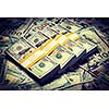 Creative business finance making money concept. Vintage retro effect filtered hipster style image of background of of new 100 US dollars 2013 edition banknotes bills bundles close up