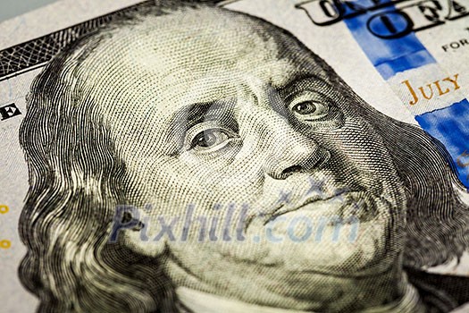 Macro shot of Benjamin Franklin portrait from a 100 bill new 2013 year edition Macro shot of Benjamin Franklin portrait from a 100 bill new 2013 year edition