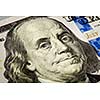 Macro shot of  Benjamin Franklin portrait from a 100 bill new 2013 year edition
