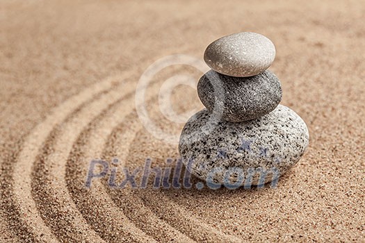 Japanese Zen stone garden - relaxation, meditation, simplicity and balance concept - pebbles and raked sand tranquil calm scene Japanese Zen stone garden - relaxation, meditation, simplicity and balance concept - pebbles and raked sand tranquil calm scene