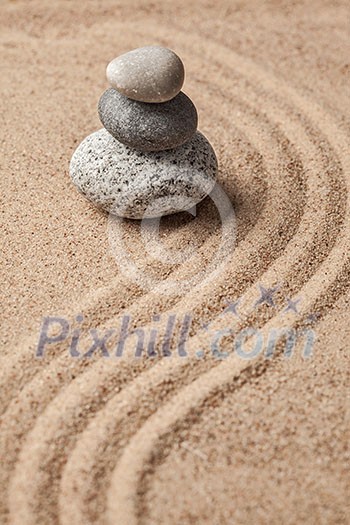 Japanese Zen stone garden - relaxation, meditation, simplicity and balance concept - pebbles and raked sand tranquil calm scene Japanese Zen stone garden - relaxation, meditation, simplicity and balance concept - pebbles and raked sand tranquil calm scene