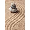 Japanese Zen stone garden - relaxation, meditation, simplicity and balance concept  - pebbles and raked sand tranquil calm scene