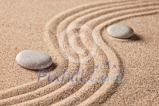 Japanese Zen stone garden - relaxation, meditation, simplicity and balance concept - pebbles and raked sand tranquil calm scene Japanese Zen stone garden - relaxation, meditation, simplicity and balance concept - pebbles and raked sand tranquil calm scene