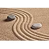 Japanese Zen stone garden - relaxation, meditation, simplicity and balance concept  - pebbles and raked sand tranquil calm scene