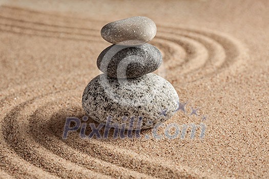 Japanese Zen stone garden - relaxation, meditation, simplicity and balance concept - pebbles and raked sand tranquil calm scene Japanese Zen stone garden - relaxation, meditation, simplicity and balance concept - pebbles and raked sand tranquil calm scene