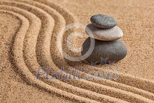 Japanese Zen stone garden - relaxation, meditation, simplicity and balance concept - pebbles and raked sand tranquil calm scene Japanese Zen stone garden - relaxation, meditation, simplicity and balance concept - pebbles and raked sand tranquil calm scene