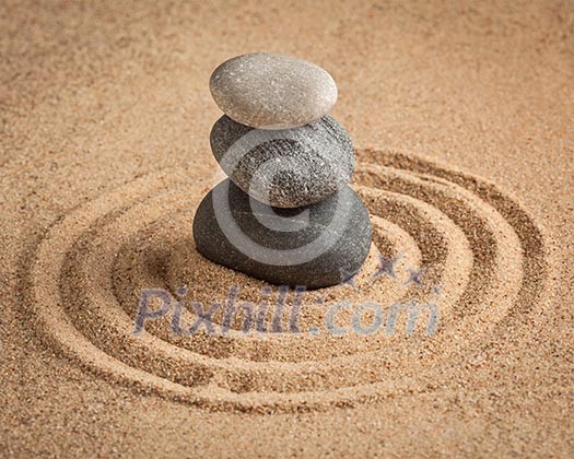 Japanese Zen stone garden - relaxation, meditation, simplicity and balance concept - pebbles and raked sand tranquil calm scene Japanese Zen stone garden - relaxation, meditation, simplicity and balance concept - pebbles and raked sand tranquil calm scene