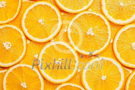 Colorful orange citrus fruit slices background top view Colorful orange citrus fruit slices background top view