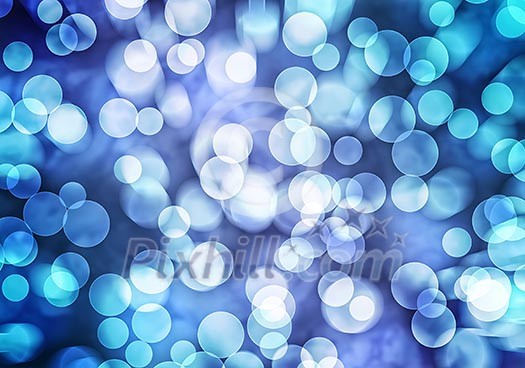 Abstract background image of blue bokeh lights and beams Abstract background image of blue bokeh lights and beams