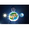 Young businessman holding Earth planet in palm. Elements of this image are furnished by NASA