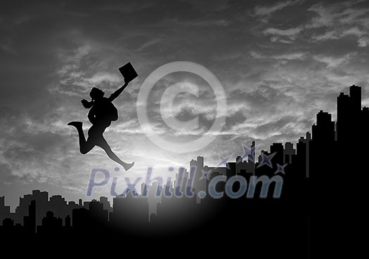 Silhouette of businesswoman jumping above city against sunset background Silhouette of businesswoman jumping above city against sunset background