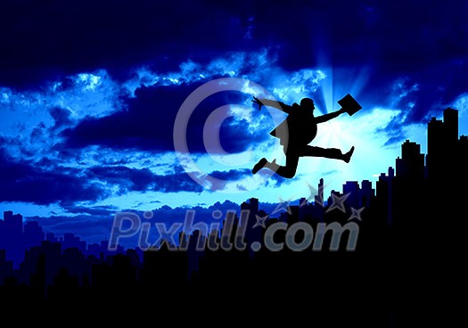 Silhouette of businessman jumping against sunset background Silhouette of businessman jumping against sunset background