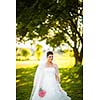 Gorgeous bride on her wedding day (color toned image; shallow DOF)