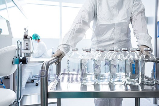 Flasks with liquids in a lab Flasks with liquids in a lab