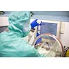 Work in super clean lab environment - (shallow DOF; color toned image)
