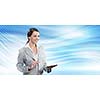 Attractive smiling businesswoman holding tablet pc in hands