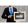 Close up of businessman holding frame with business sketch