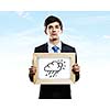 Young businessman holding frame with weather drawings