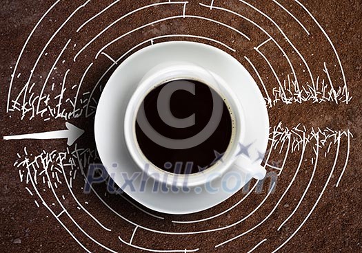 Close up of cup of coffee on table with sketches on background Close up of cup of coffee on table with sketches on background