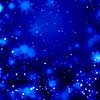 Blue Christmas background with snowflakes and lights