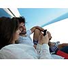 cheerful happy young couple making selfie together at home