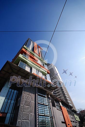 modern building at sunny day and clear blue sky
modern building at sunny day and clear blue sky