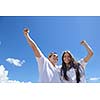happy young couple have fun and relax  on the beach