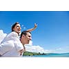 happy young couple have fun and relax  on the beach