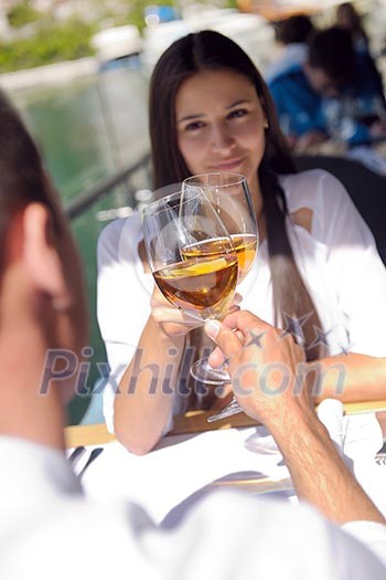 happy young couple having lanch at beautiful restaurant on the beach happy young couple having lanch at beautiful restaurant on the beach