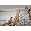 volleyball game sport with group of young beautiful girls indoor in sport arena school gym